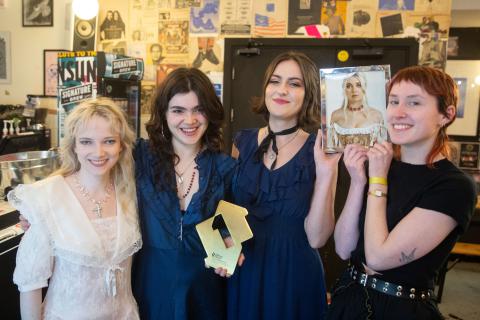 The Last Dinner Party pose with their Number 1 album award for Prelude to Ecstasy